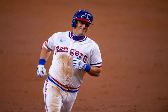 Jun 25, 2022; Arlington, Texas, USA; Texas Rangers first baseman Nathaniel Lowe (30) rounds the bases after he hits a two run home run against the Washington Nationals during the second inning at Globe Life Field. Mandatory Credit: Jerome Miron-USA TODAY Sports